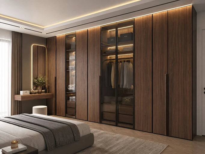 Luxury floor-to-ceiling MDF wardrobe with walnut wood texture and integrated LED lighting.